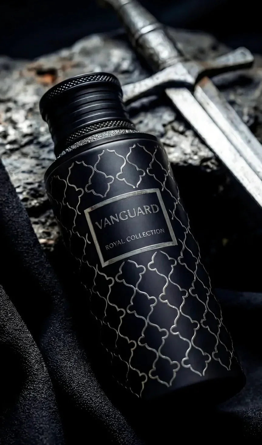 Vanguard Royal Collection oud perfume bottle with Arabic pattern, styled on stone with sword