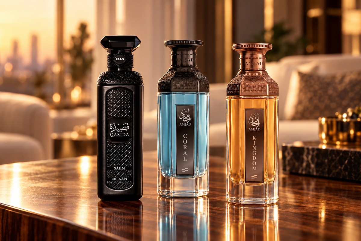 FAAN perfumes Qasida Sahm, Amjad Coral and Amjad Kingdom on a polished walnut table