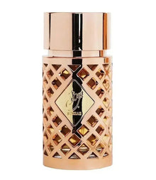 Luxury Arabian oud perfume bottle with gold lattice design and Arabic script label
