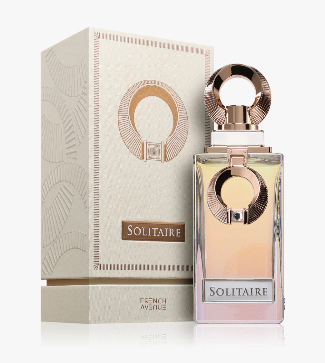 Solitaire perfume bottle and packaging on a white background