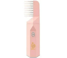 Pink electric beard comb with gold Arabic logo, modern design against white background
