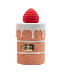 Strawberry-scented Arabian oud perfume bottle shaped like a cake with a strawberry lid.