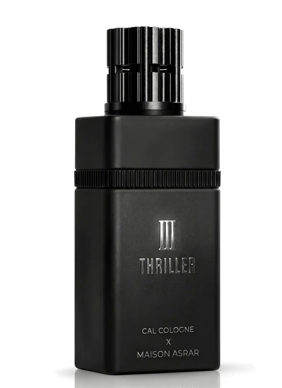 Black cologne bottle labeled 'Thriller' by Maison Asrar on a white background