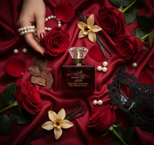 Luxury oud perfume bottle on red satin with roses, vanilla, pearls, black lace mask, and a hand.