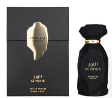 Black Al Noor Arabiyat Prestige perfume bottle with gold accents beside matching luxury box