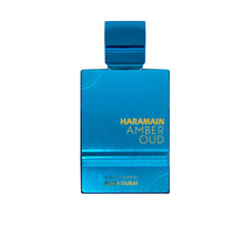 Blue Haramain Amber Oud Aqua Dubai perfume bottle with gold text on white background