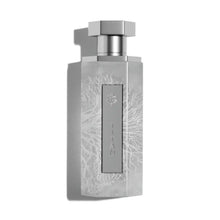 Titan Arabian oud perfume bottle with silver accents on white background