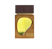 Perfume bottle with wooden cap and gold design on a white background