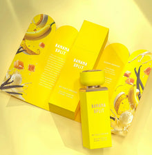 Banana Split perfume bottle and packaging with banana, caramel, and vanilla design elements