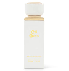 Elegant white and gold bottle of Coco Blanc oud Eau de Parfum, 100ml, luxury Arabian fragrance