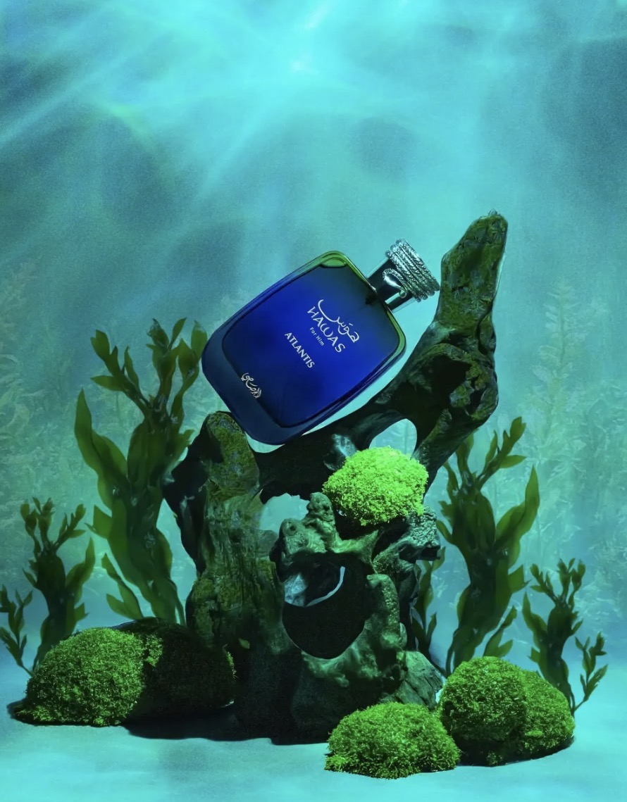 Perfume bottle with 'Alfiero' label on a decorative underwater scene