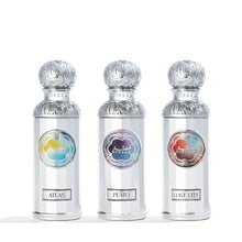 Three luxury Arabian oud perfume bottles with silver ornate caps, labeled Atlas, Plato, and Lost City.
