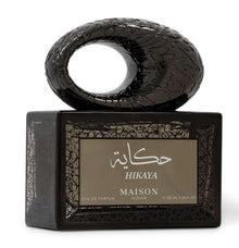 Maison Asrar Hikaya Arabian oud perfume with ornate black bottle and Arabic calligraphy