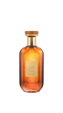 Mousuf Eau de Parfum amber glass bottle with gold label and wooden cap, Arabian oud fragrance