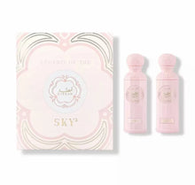 Pink Arabic perfume gift set with two elegant bottles and decorative box labeled 'Legend of the Sky'.