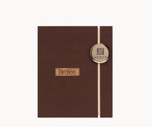 Luxury brown Brûlée perfume gift box with gold accent and Ahmed Al Maghribi logo