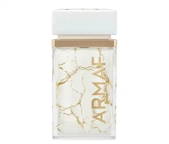 Elegant glass perfume bottle with white marble pattern and gold ARMAF lettering