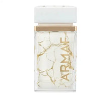 Elegant glass perfume bottle with white marble pattern and gold ARMAF lettering