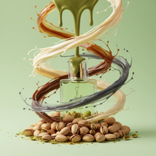 Perfume bottle surrounded by pistachios, swirling cream, brown, and green liquid on pastel background