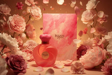 Blush Noire perfume bottle and floral pink gift box surrounded by pink roses and petals