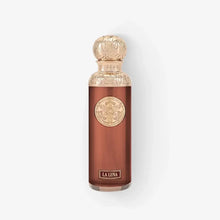 Luxury Arabian oud perfume bottle with ornate gold cap and brown glass, labeled La Luna