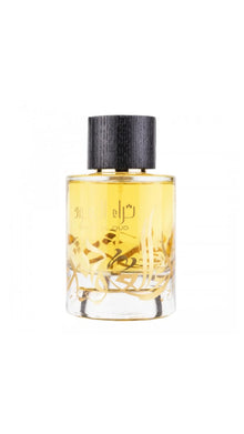 Glass bottle of Arabian oud perfume with gold Arabic script and black wood-textured cap.