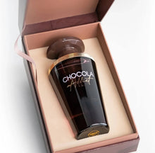Luxury Chocola Addict Arabian oud perfume bottle in a gift box, brown and gold packaging.