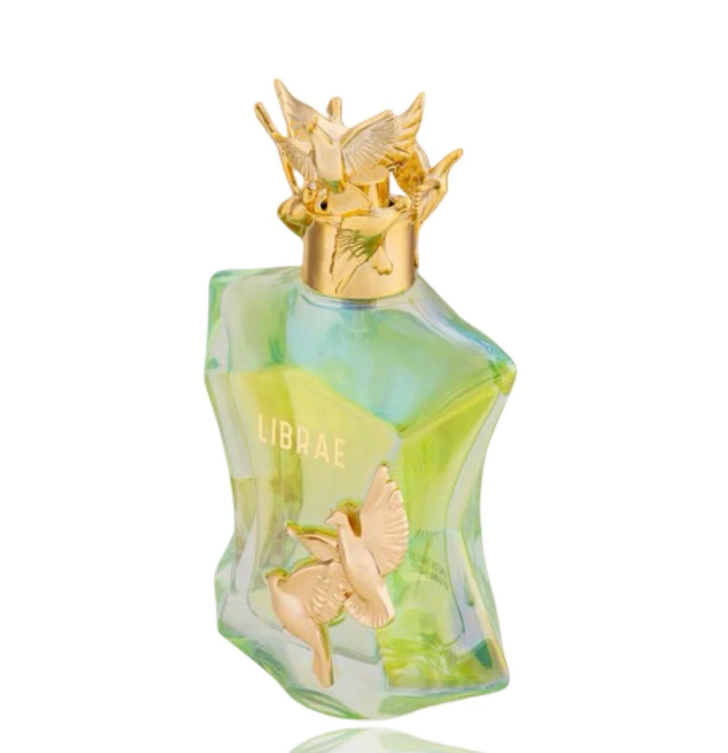 Librae perfume bottle with gold bird accents and green glass, Arabian oud fragrance