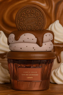 Lattafa Cookie Crave Give Me Gourmand perfume bottle shaped like a cupcake with chocolate cookie and cream details