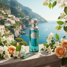 Elegant blue perfume bottle with silver cap, floral accents, and coastal background.