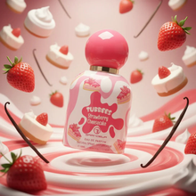 Strawberry cheesecake perfume bottle surrounded by strawberries, cheesecake, and vanilla pods.