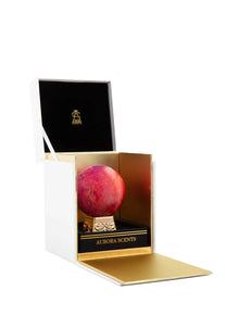 Aurora Scents luxury oud perfume gift set with a pink decorative sphere in a gold and white box