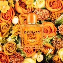 Rayhaan Floriana oud perfume bottle for her surrounded by vibrant orange and yellow flowers
