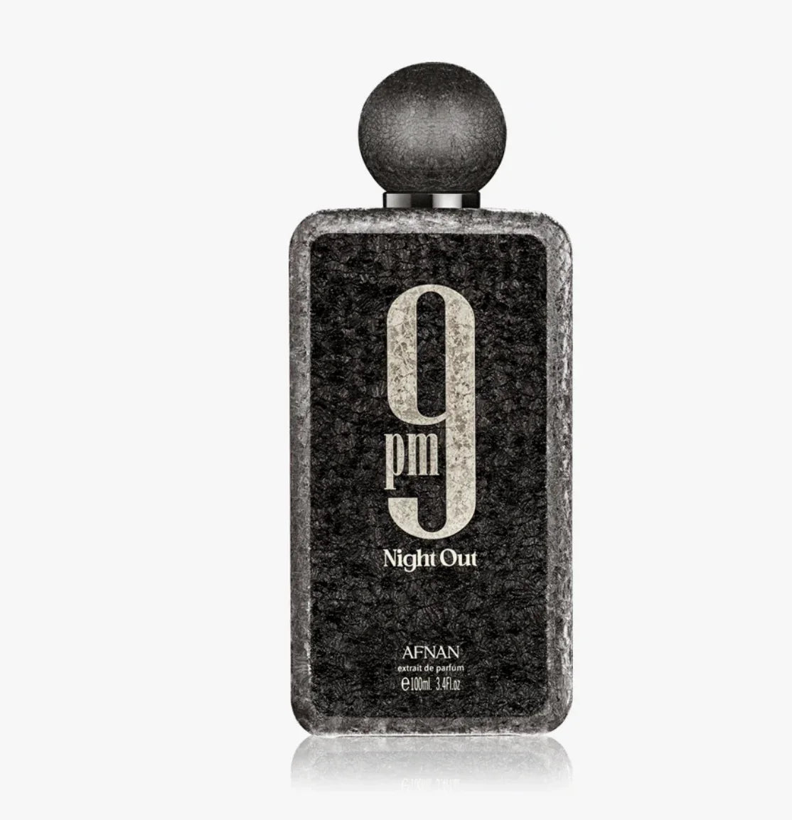 Afnan 9pm Night Out perfume bottle with black textured design on a white background