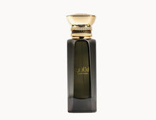 Elegant dark glass Arabian oud perfume bottle with gold cap and Laathani label