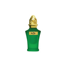 Green perfume bottle with gold cap on a white background