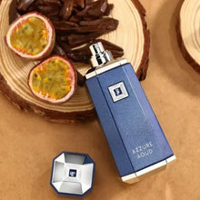 Azzure Oud perfume bottle with a blue and silver design, displayed beside passion fruit and oud wood slices.