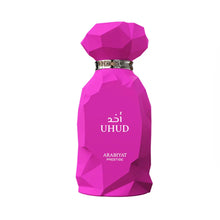 Bright pink geometric perfume bottle labeled UHOD Arabic fragrance by Arabiyat Prestige