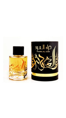 Thara Al Oud Arabian oud perfume bottle and box with gold Arabic calligraphy.