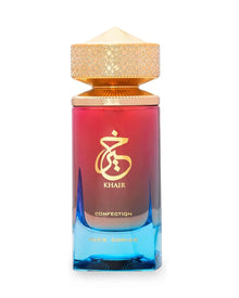 Elegant Arabian oud perfume bottle with gold cap, gradient red and blue glass, labeled Khair Confection