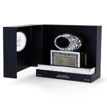 Luxury Arabian oud perfume gift set with decorative bottle and elegant box