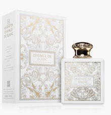 Elegant Essence De Blanc perfume bottle and box with gold ornate design, Arabian fragrance