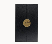 Elegant black textured gift box with gold Laathani emblem, ideal for luxury oud perfume.
