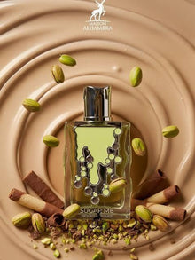 Maison Alhambra Sugar Me pistachio chocolate perfume bottle with pistachios and chocolate sticks on creamy backdrop.