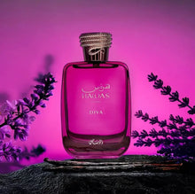 Hawas for Her Diva perfume bottle with floral accents and purple lighting, Arabian oud fragrance