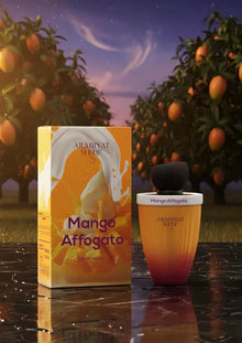 Mango Affogato perfume bottle and box on marble, with mango trees in the background at sunset.