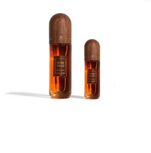 Two amber bottles of Vintage Tobacco oud perfume with wooden caps on white background