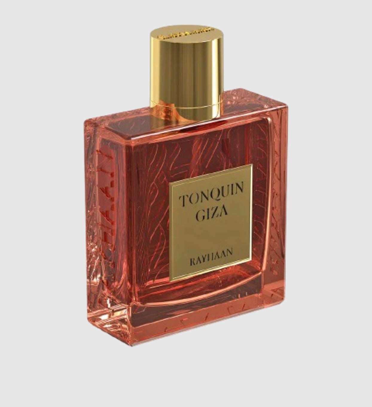 Perfume bottle with gold cap and 'Tonquin Giza' label on a light gray background