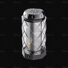 Elegant crystal air freshener diffuser with geometric pattern on black background