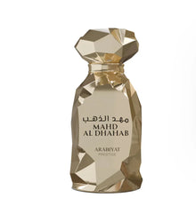 Gold crystal-shaped bottle of Mahd Al Dhahab Arabian oud perfume by Arabiyat Prestige